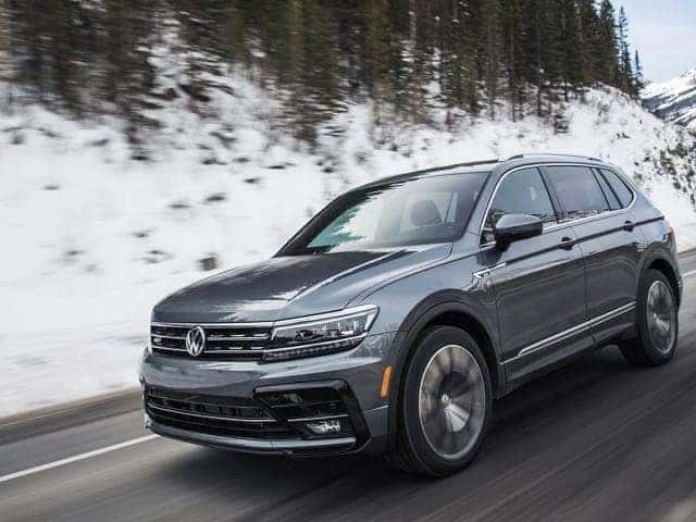 VW SUV driving down a road