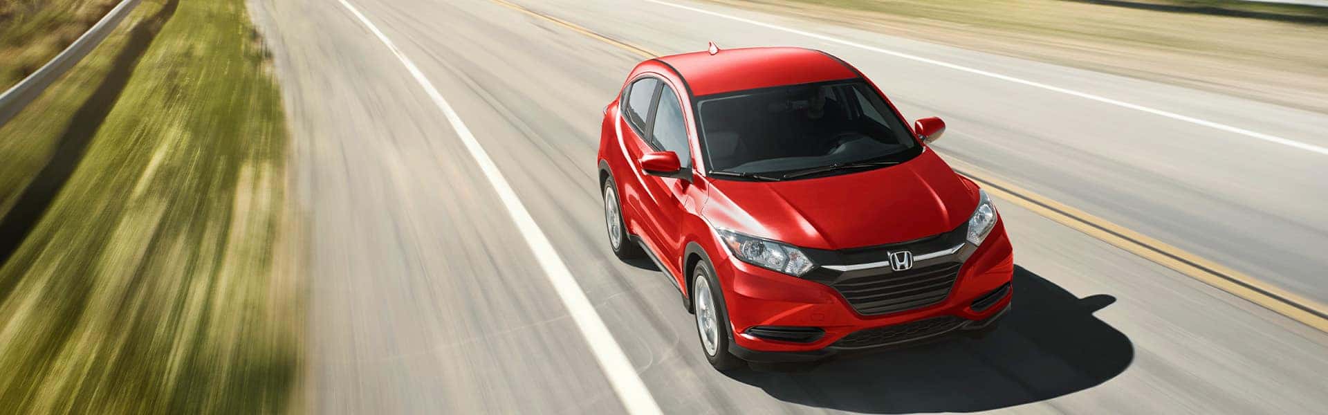 Things to Check When Buying a Used Car | Washington Honda | Red Used Honda HR-V Driving Fast on Road