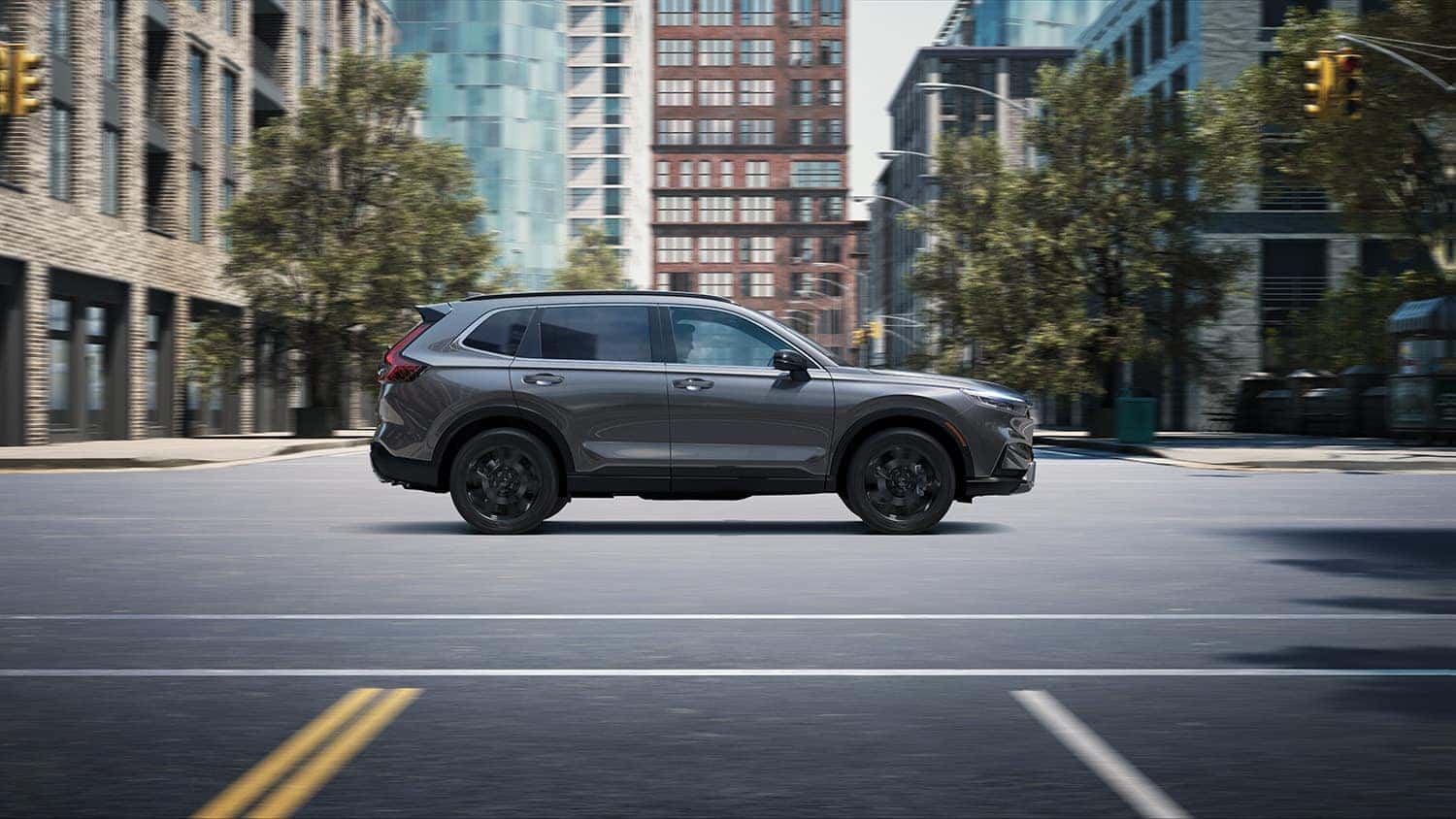 New 2023 Honda CR-V at Washington Honda | 2023 Honda CR-V driving through town